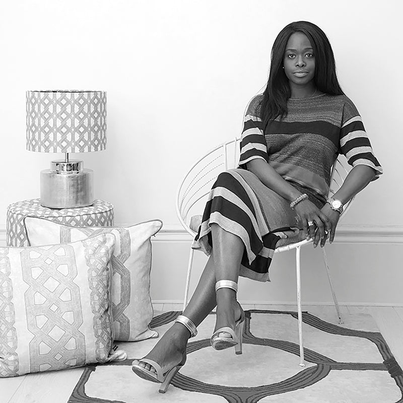 Luxury textile maker, Eva Sonaike, pursues her passion for bold colors and African prints by creating designs that are inspired by African architecture and traditional textile dyeing techniques. Sonaike is dedicated to creating vibrant, colorful fabrics that elegantly accessorize the home. ABOUT THE DESIGNER