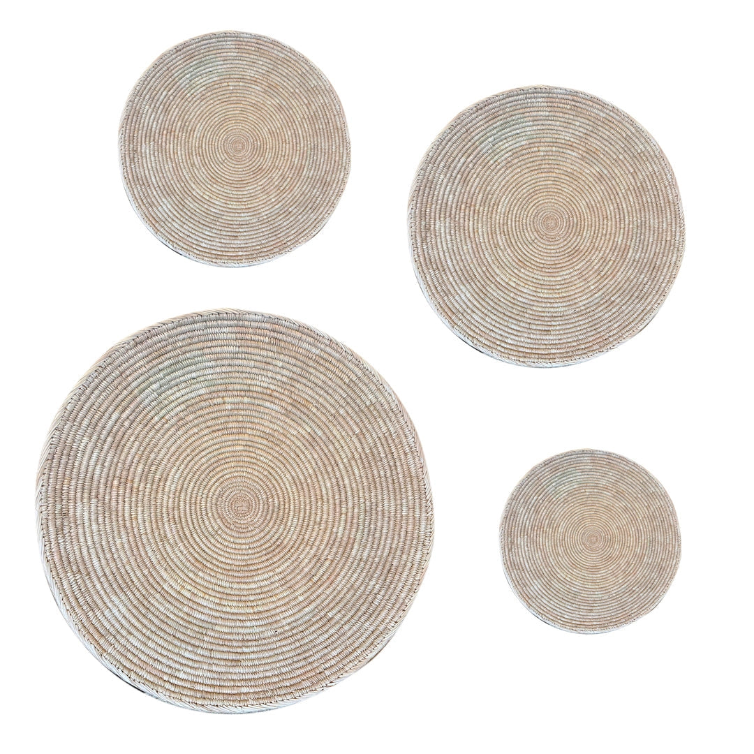 Flat woven wall basket in the Ndebele tradition, handwoven in Zimbabwe, natural cream pattern set of 4