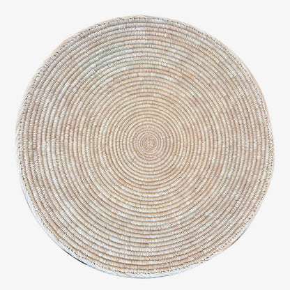 Flat woven wall basket in the Ndebele tradition, handwoven in Zimbabwe, natural cream pattern